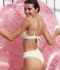 White swimsuit with a knot White swimsuit with a knot