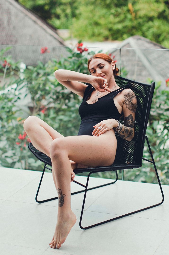 One-piece black swimsuit with ties One-piece black swimsuit with ties