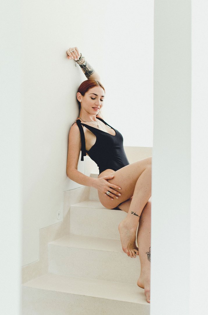 One-piece black swimsuit with ties One-piece black swimsuit with ties
